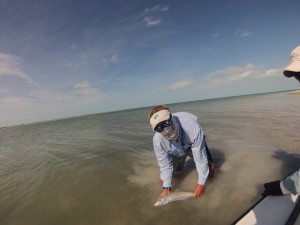Sharks intern Carl Treyz catches his first bonefish on fly.