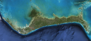 The Island of Grand Bahama.  The dark blue color on the south side of the island indicates deep water.  The red line is the Grand Lucayan Waterway built in the 70’s that connects the north and south side of the island.