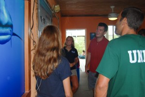 Spring 2015 Island School students discuss their findings on post-release survivorship with Jack Johnson and Youth Island Action Summit attendees (Photo Credit-Cam Powel)