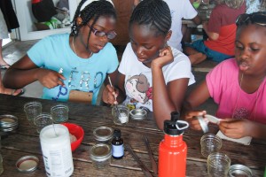 Students at the summit make all-natural tooth paste.