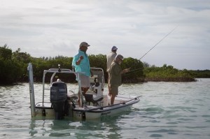 Denny Rankine assists the team in catching bonefish in Savannah Sound.